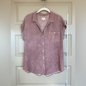 Light pink top. Cute tucked into cutoff jean shorts!